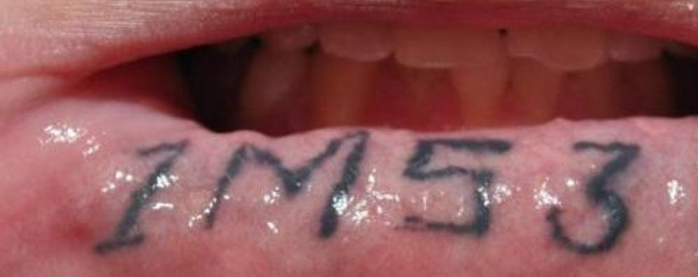 Un tatuaggio su un labbro: il segno di riconoscimento di uno degli affiliati alla gang Ms 13