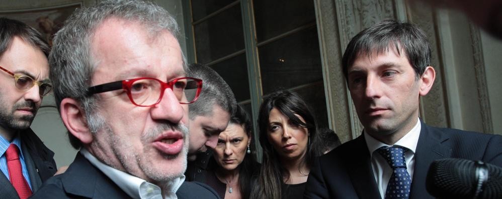 Roberto Maroni e a destra il nuovo vicepresidente della Regione Lombardia, Fabrizio Sala