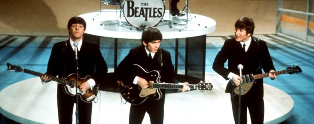 The Beatles: McCartney, Harrison e Lennon (alla batteria Ringo Starr)