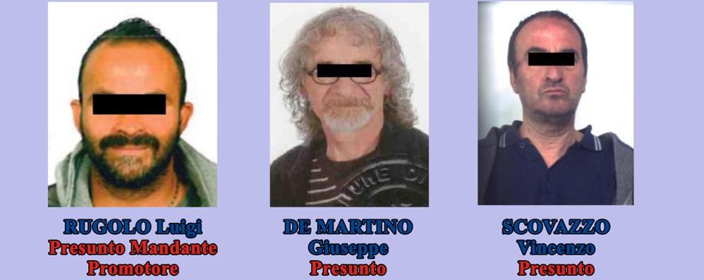 Giuseppe De Martino, 55 anni, al centro della foto insieme ad altri due arrestati nel luglio del 2016