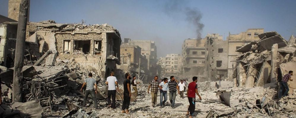 Gli effetti dei bombardamenti ad Aleppo. Il tunisino espulso aveva coltivato l’aspirazione a raggiungere la Siria