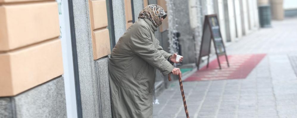 Una mendicante a Monza