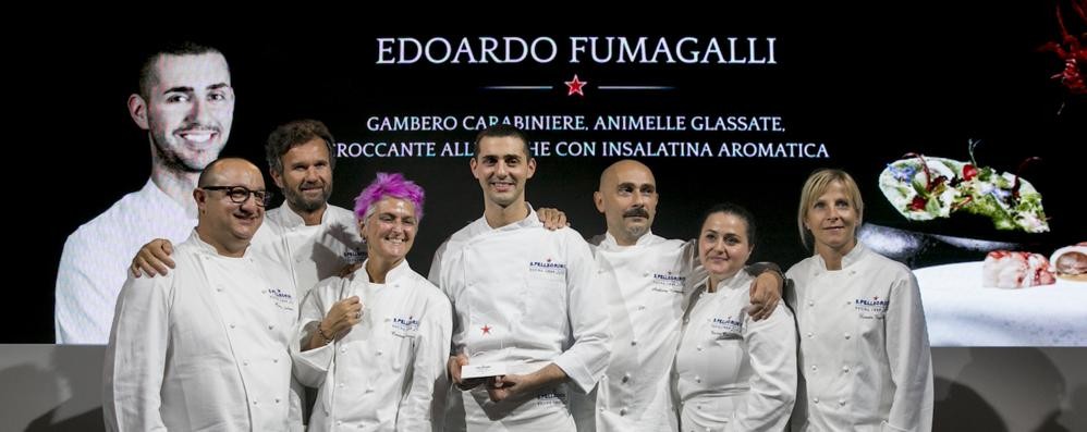 Lo chef Ediardo Fumagalli, al centro, alla cerimonia di ammissione alla finalissima del San Pellegrino Young Chef 2018