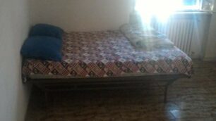 Un letto della casa occupata