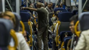 Pendolari in  treno