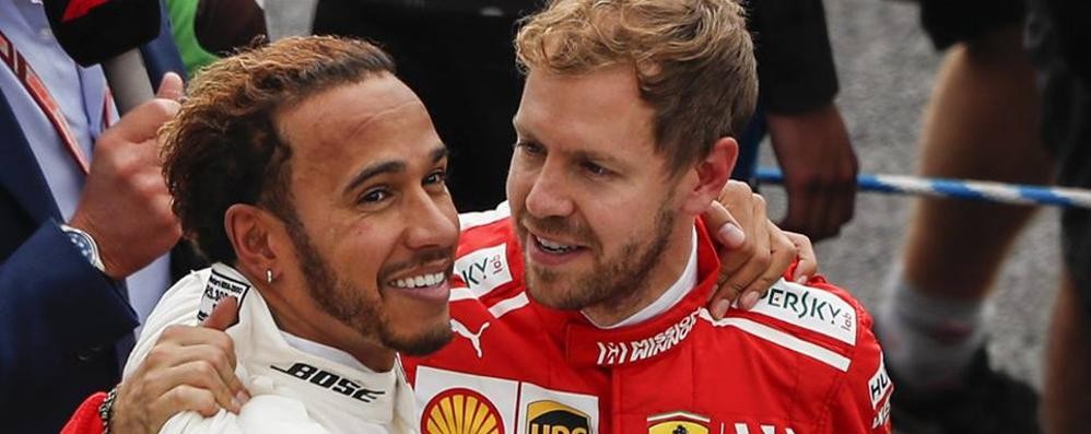 Lewis Hamilton e Sebastian Vette