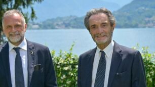 A destra, il governatore Attilio Fontana