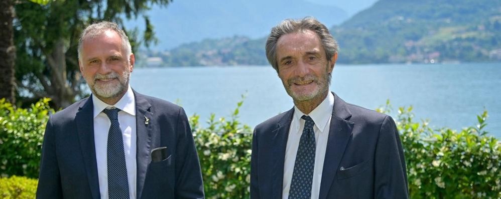 A destra, il governatore Attilio Fontana