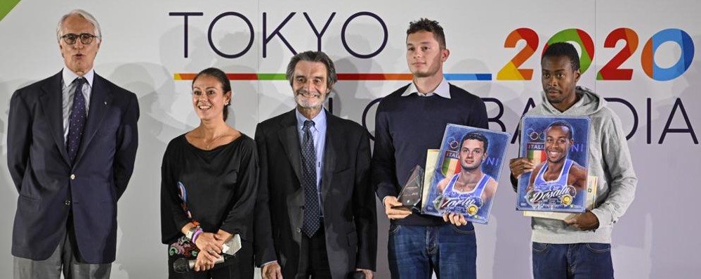 Regione Lombardia premiazione medaglie olimpiche Tokyo 2020: Filippo Tortu e Fausto Desalu con Giusy Versace, il presidente Attilio Fontana e il presidente del Coni Giovanni Malagò