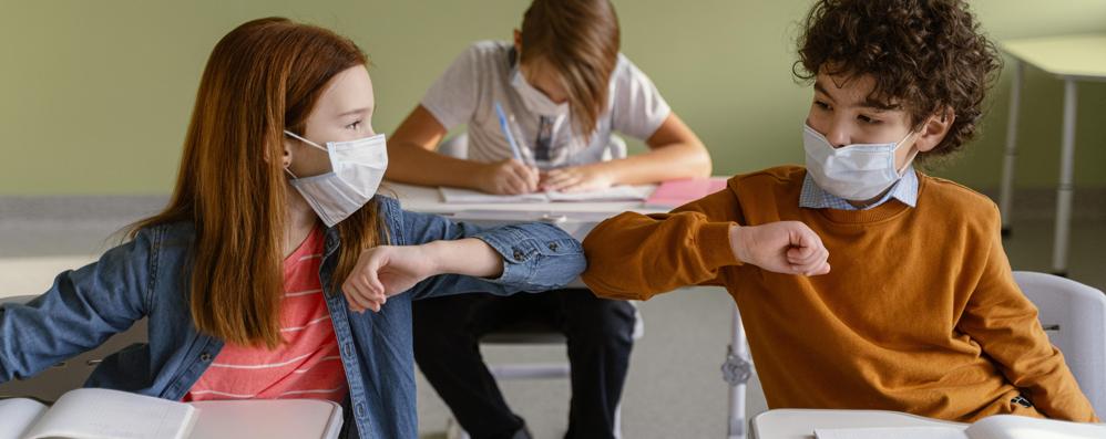 Scuola classe covid coronavirus studenti bambini - foto creata da freepik/it.freepik.com