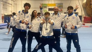 Ginnastica Sampietrina tre ginnasti con staff tecnico 2024