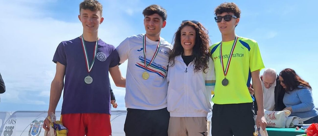 Atletica Rebosio 1° a sinistra con Di Sabato Giuseppe Campione italiano e Coppola Alessio insieme a Antonella Palmisano