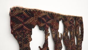 Ariel Schlesinger Untitled (Burnt Turkmenistan carpet), 2021 Burnt carpet Courtesy Galleria Massimo Minini, Brescia