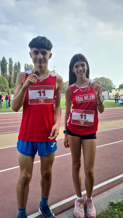 Atletica Garzotto Diego Ciortan Emma con medaglia a Meda